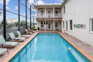 The backyard pool area at a Panama City Beach rental that's perfect for a spring break vacation.