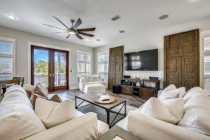 After fishing at he best spots in Panama City Beach, relax in this cozy vacation rental living room.