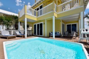 A vacation rental wit a pool, perfect for relaxing in after checking out Florida panhandle state parks.