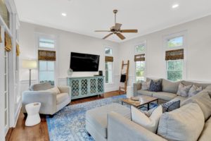The living room of a Florida vacation rental to relax in while researching things to do in Rosemary Beach.